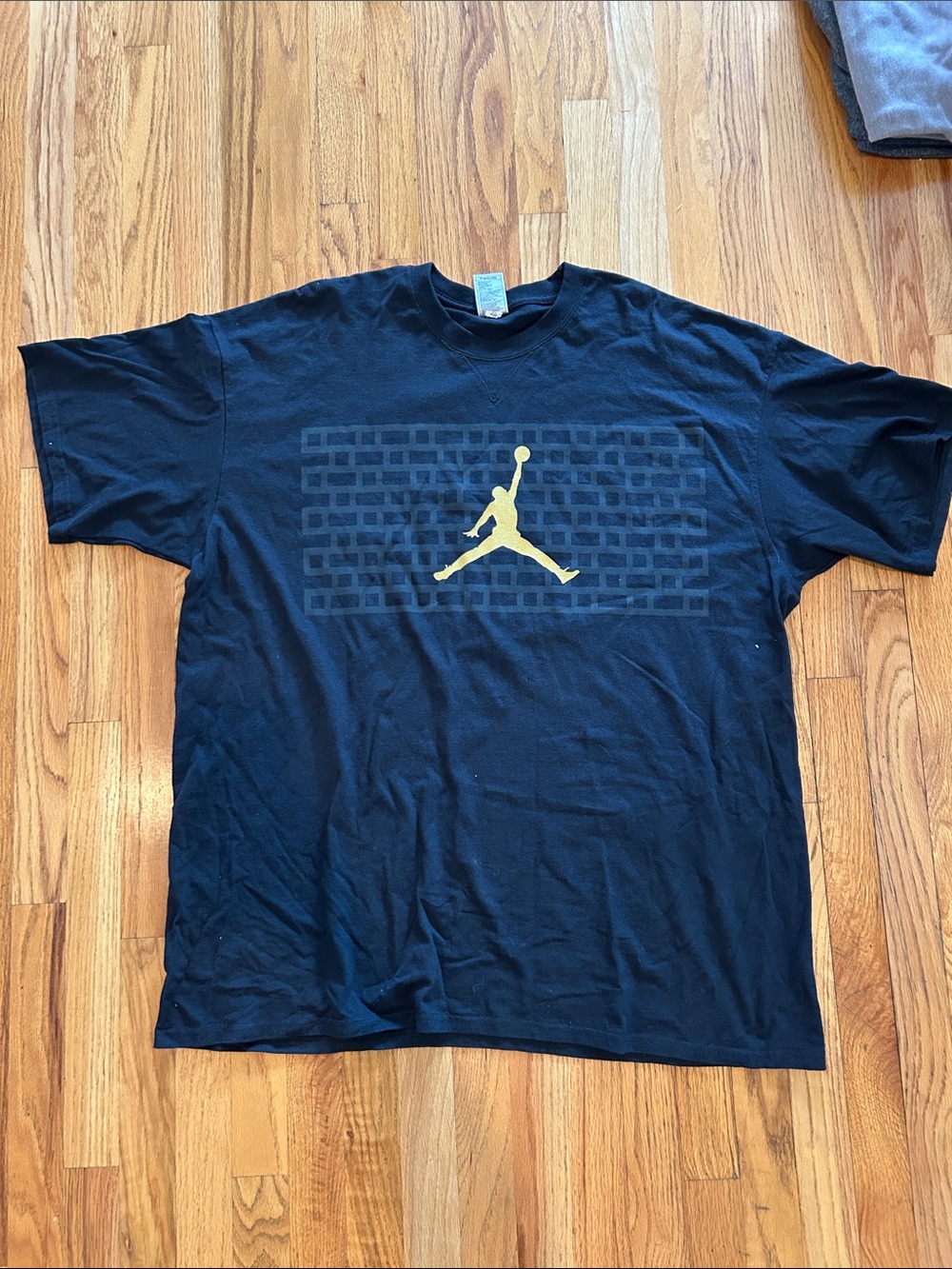 Jordan Black Tee with Gold Jumpman Graphic